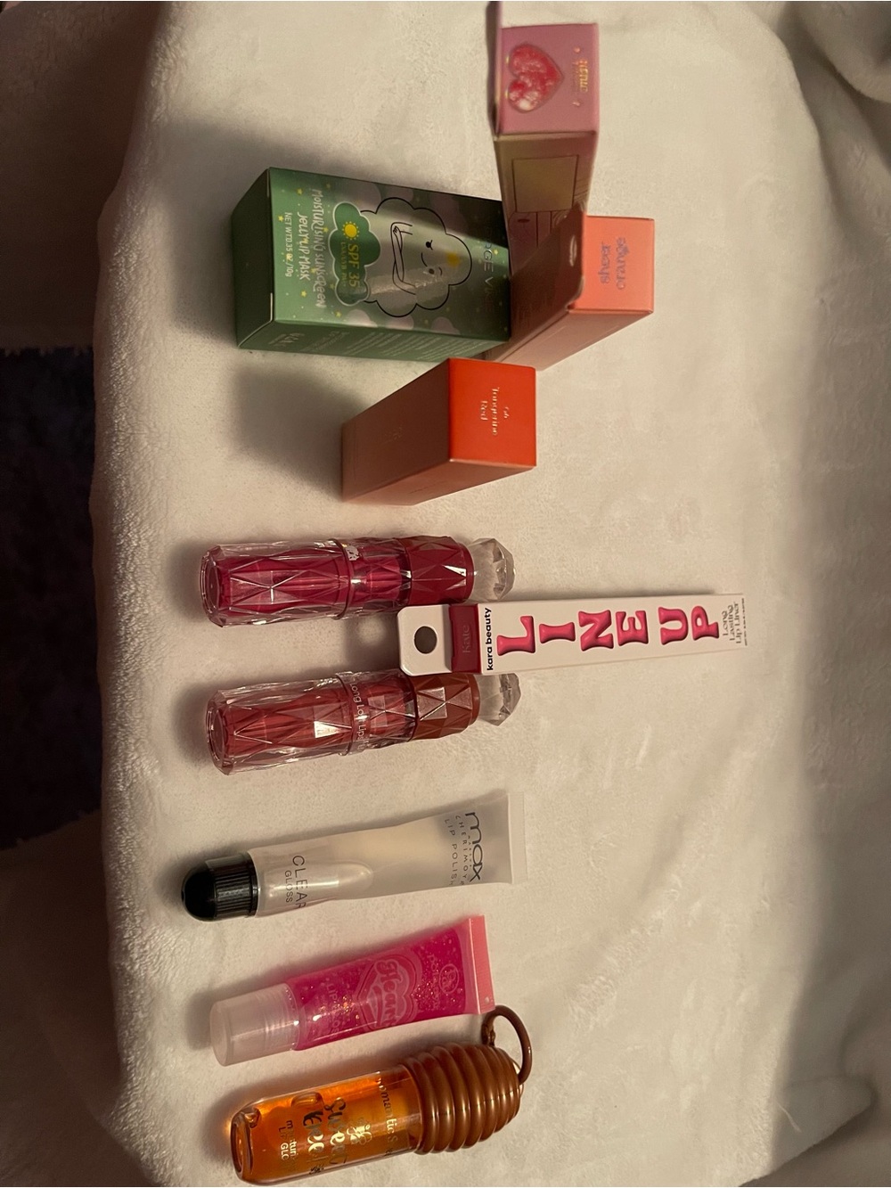 Assorted Women’s Lip Gloss & Balm Set in Pink and lip liner and lip stick